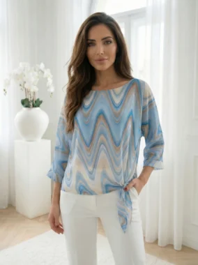 Bluza albastra cu imprimeu abstract si nod lateral