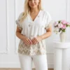 bluza-dama-alba-cu-broderie-geometrica-aurie-si-decolteu-in-v