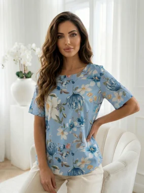 Bluza eleganta bleu cu imprimeu floral si funda la spate