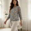 bluza-eleganta-bleu-cu-imprimeu-floral-si-nod-decorativ