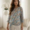 bluza-eleganta-bleu-cu-imprimeu-floral-si-nod-decorativ