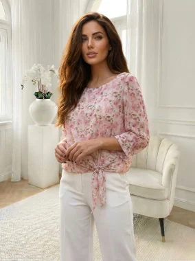 Bluza eleganta roz cu imprimeu floral si nod decorativ