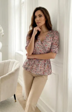 Bluza tip peplum cu imprimeu floral si maneci bufante