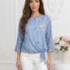 bluza-vaporoasa-albastra-cu-imprimeu-floral-si-nod-in-talie