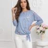 bluza-vaporoasa-albastra-cu-imprimeu-floral-si-nod-in-talie