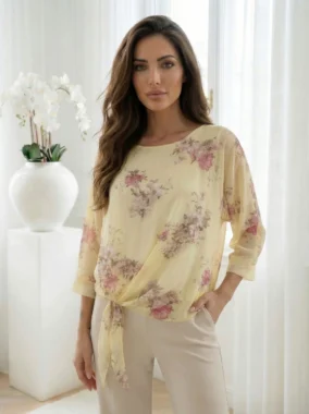 Bluza vaporoasa galbena cu imprimeu floral si nod in talie