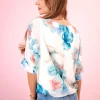 camasa-lejera-cu-imprimeu-floral-albastru-si-nod-decorativ