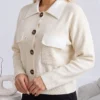 cardigan-din-tricot-cu-guler-si-buzunare-din-piele-ecologica