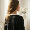 cardigan-elegant-negru-cu-detalii-albe-si-nasturi-decorativi