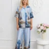 compleu-elegant-albastru-din-satin-cu-imprimeu-artistic-si-pantaloni-largi