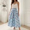 fusta-midi-bleu-cu-buline-si-funda-in-talie