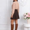 fusta-scurta-eleganta-cu-pliuri-si-nasturi-aurii