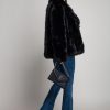 geaca-neagra-eleganta-din-blana-cu-guler-amplu