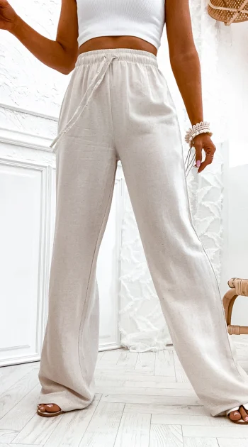pantaloni-bej-cu-croi-lejer-si-snur-in-talie