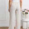 pantaloni-din-material-vaporos-cu-imprimeu-in-dungi-si-cordon