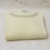 pulover-galben-vanila-cu-guler-decorat-cu-perlute