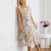 rochie-eleganta-cu-broderie-englezeasca-si-maneci-cu-volane