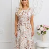 rochie-eleganta-cu-broderie-englezeasca-si-maneci-cu-volane