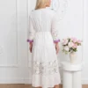 rochie-lunga-alba-brodata-cu-ciucuri-colorati-si-insertii-de-dantela