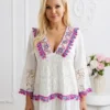 rochie-lunga-alba-brodata-cu-ciucuri-colorati-si-insertii-de-dantela
