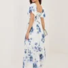 rochie-lunga-alba-brodata-cu-imprimeu-floral-albastru