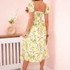 rochie-midi-alba-cu-imprimeu-lamai-si-crapatura-laterala