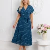rochie-midi-albastra-din-vascoza-cu-buline-si-decolteu-petrecut