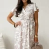 rochie-midi-bej-cu-imprimeu-floral-alb-si-croiala-petrecuta