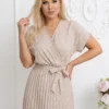 rochie-midi-bej-plisata-cu-buline-albe-si-decolteu-petrecut