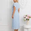 rochie-midi-bleu-din-vascoza-cu-buline-si-decolteu-petrecut