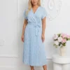rochie-midi-bleu-din-vascoza-cu-buline-si-decolteu-petrecut