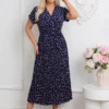 rochie-midi-bleumarin-plisata-cu-buline-si-decolteu-petrecut