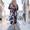 rochie-midi-cu-imprimeu-abstract-maro-si-decolteu-petrecut
