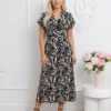 rochie-midi-cu-imprimeu-alb-negru-si-decolteu-petrecut