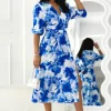 rochie-midi-cu-imprimeu-floral-albastru-decolteu-petrecut-si-maneci-bufante