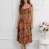 rochie-midi-maro-cu-imprimeu-floral-bogat-si-bretele-cu-funda