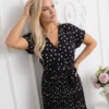rochie-midi-neagra-din-vascoza-cu-buline-si-decolteu-petrecut