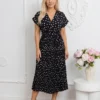 rochie-midi-neagra-din-vascoza-cu-buline-si-decolteu-petrecut
