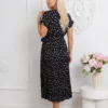rochie-midi-neagra-din-vascoza-cu-buline-si-decolteu-petrecut