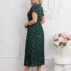rochie-midi-verde-din-vascoza-cu-buline-si-decolteu-petrecut