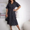 rochie-neagra-midi-cu-buline-albe-si-crapatura-laterala