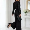 salopeta-eleganta-neagra-cu-paiete-si-pantaloni-largi