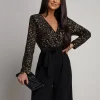 salopeta-neagra-eleganta-cu-paiete-si-pantaloni-largi