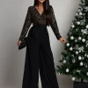salopeta-neagra-eleganta-cu-paiete-si-pantaloni-largi